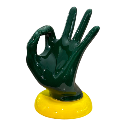 Amagè - mano “OK” in verde base gialla